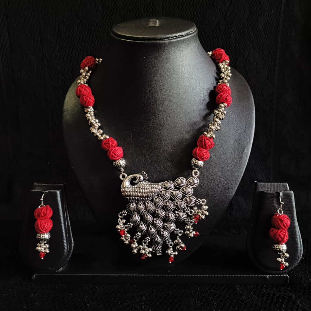 Red cotton bead oxidized peacock pendent set